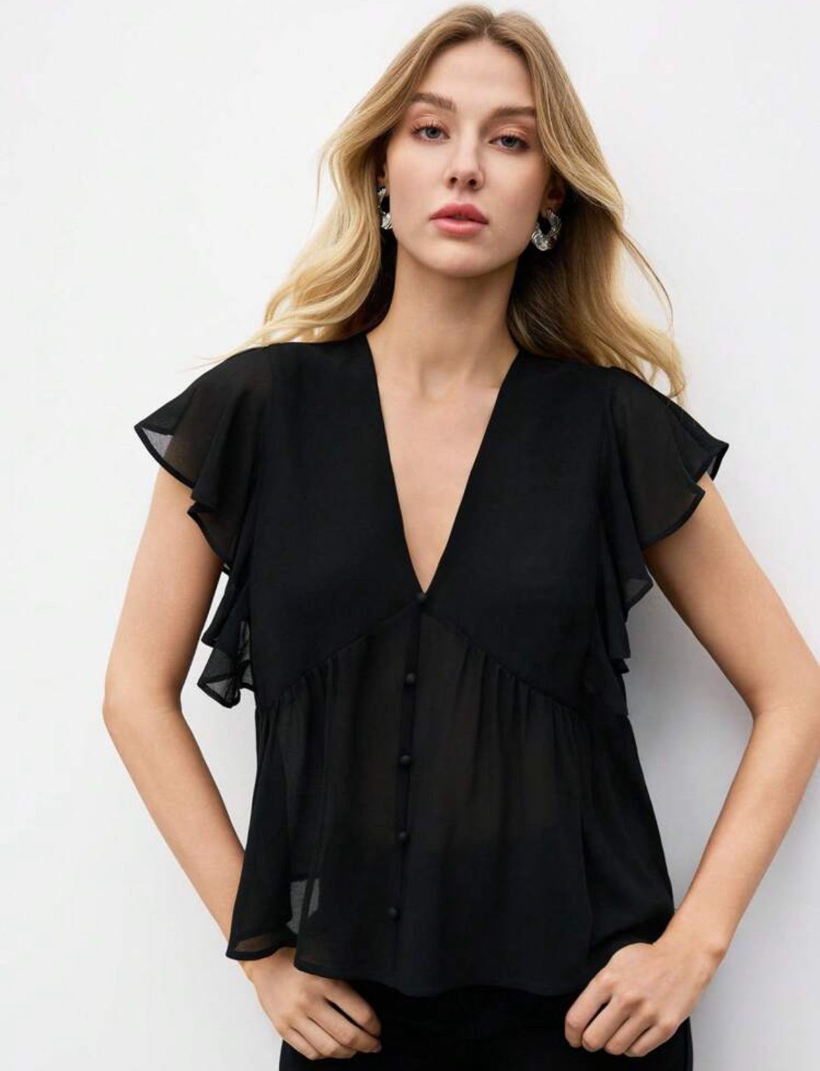BLOUSE NOIR À VOLANTS
