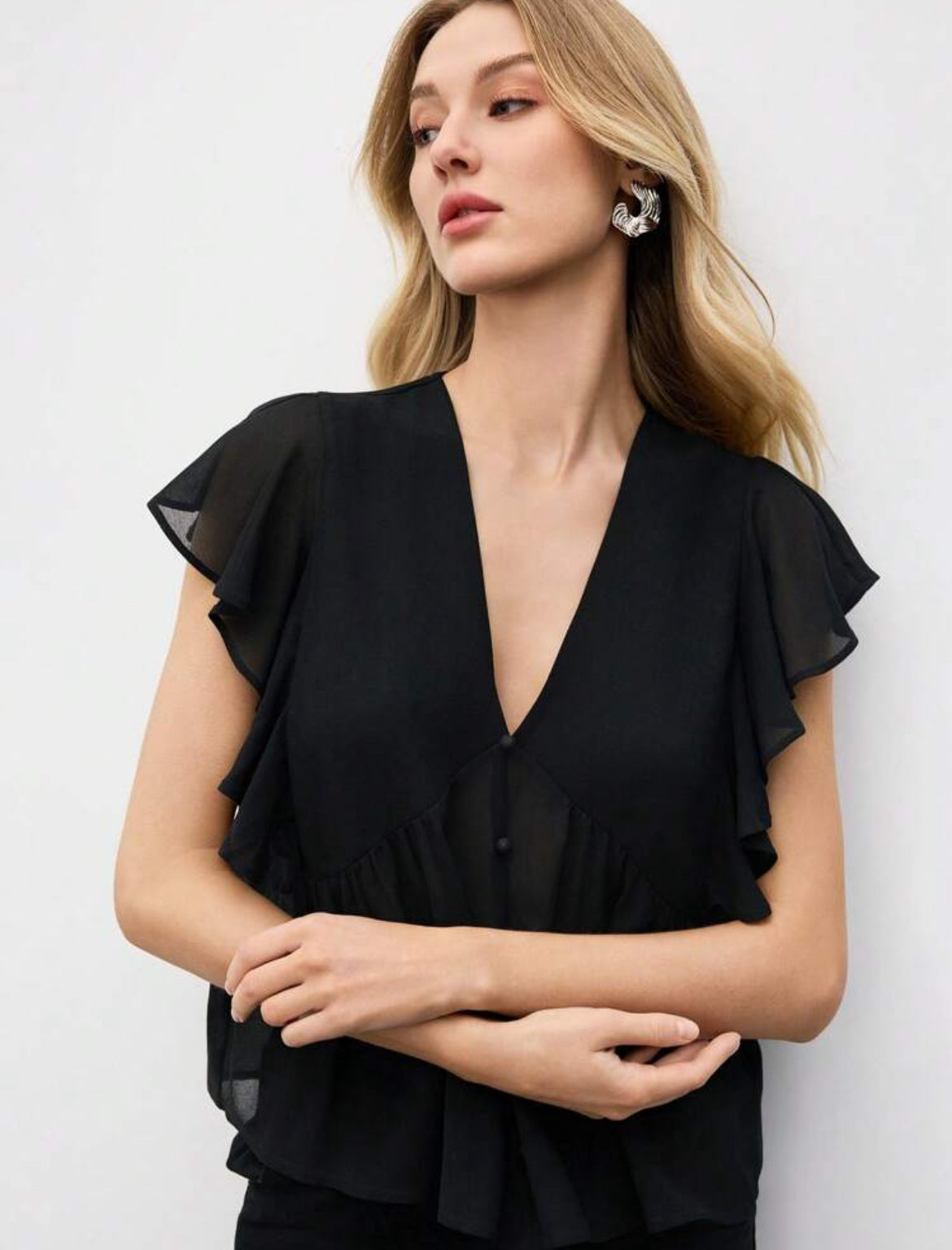 BLOUSE NOIR À VOLANTS