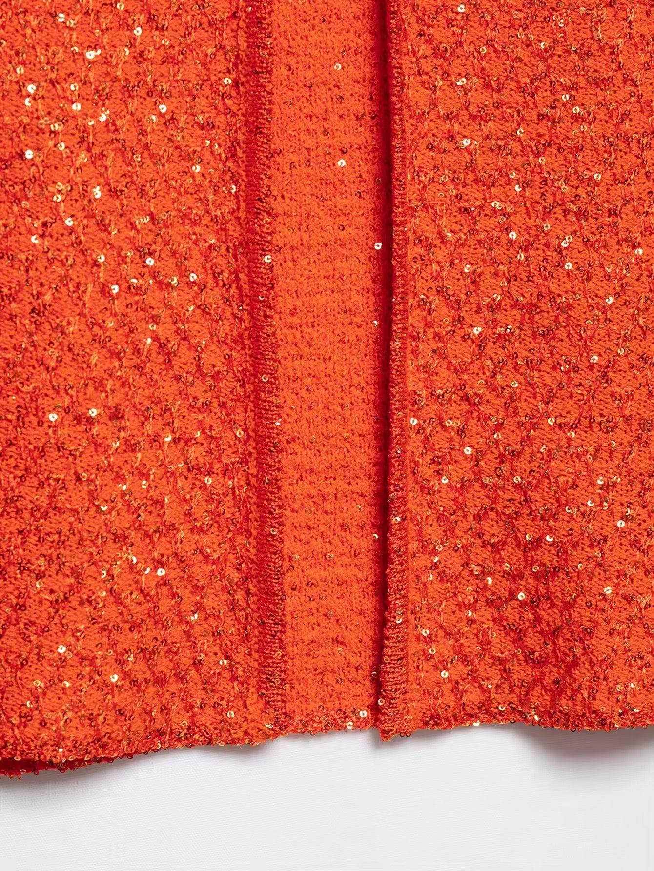 TOP IN MAGLIA CON PAILLETTES