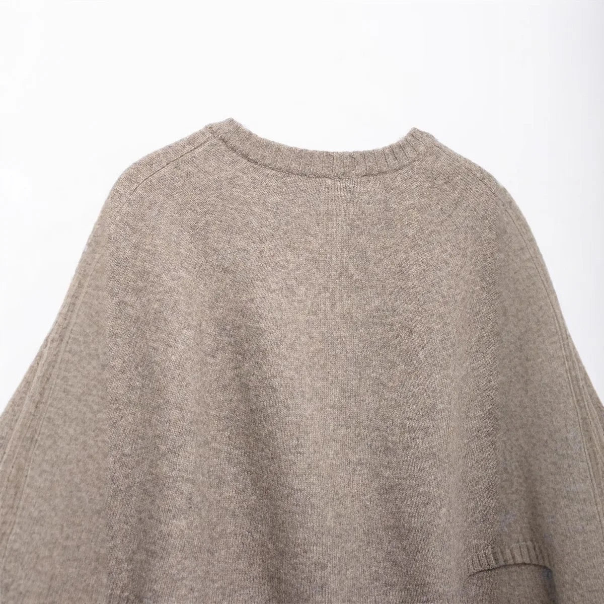 Poncho in maglia • Donna 