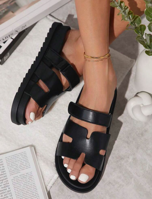 MULES PLATES EN CUIR PU