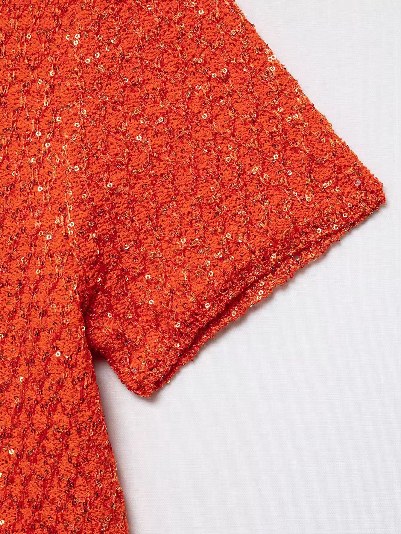 TOP IN MAGLIA CON PAILLETTES