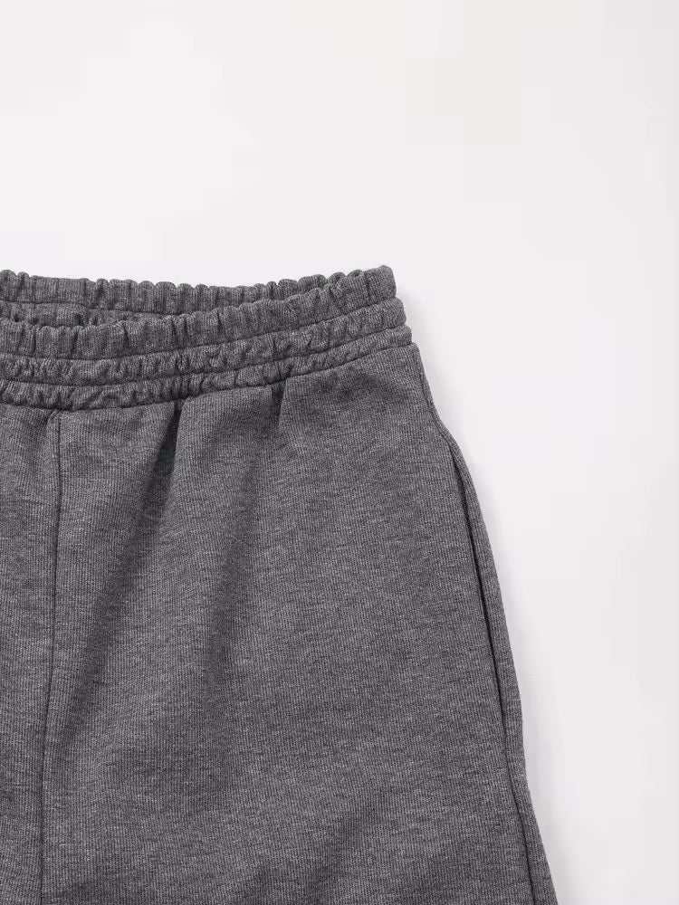 Joggers larghi bianchi minimalisti in vita elastica 