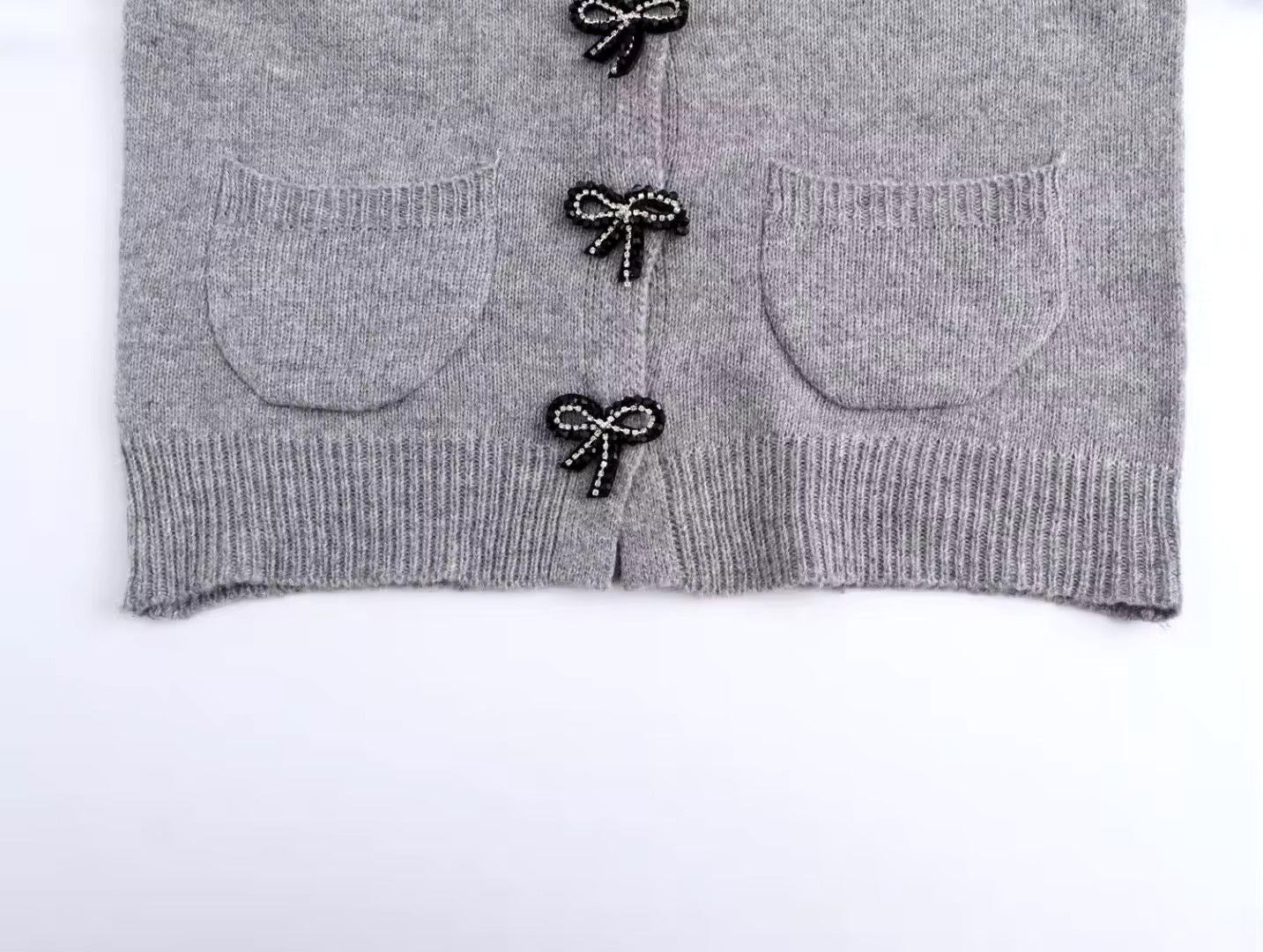 Cardigan con papillon • Donna